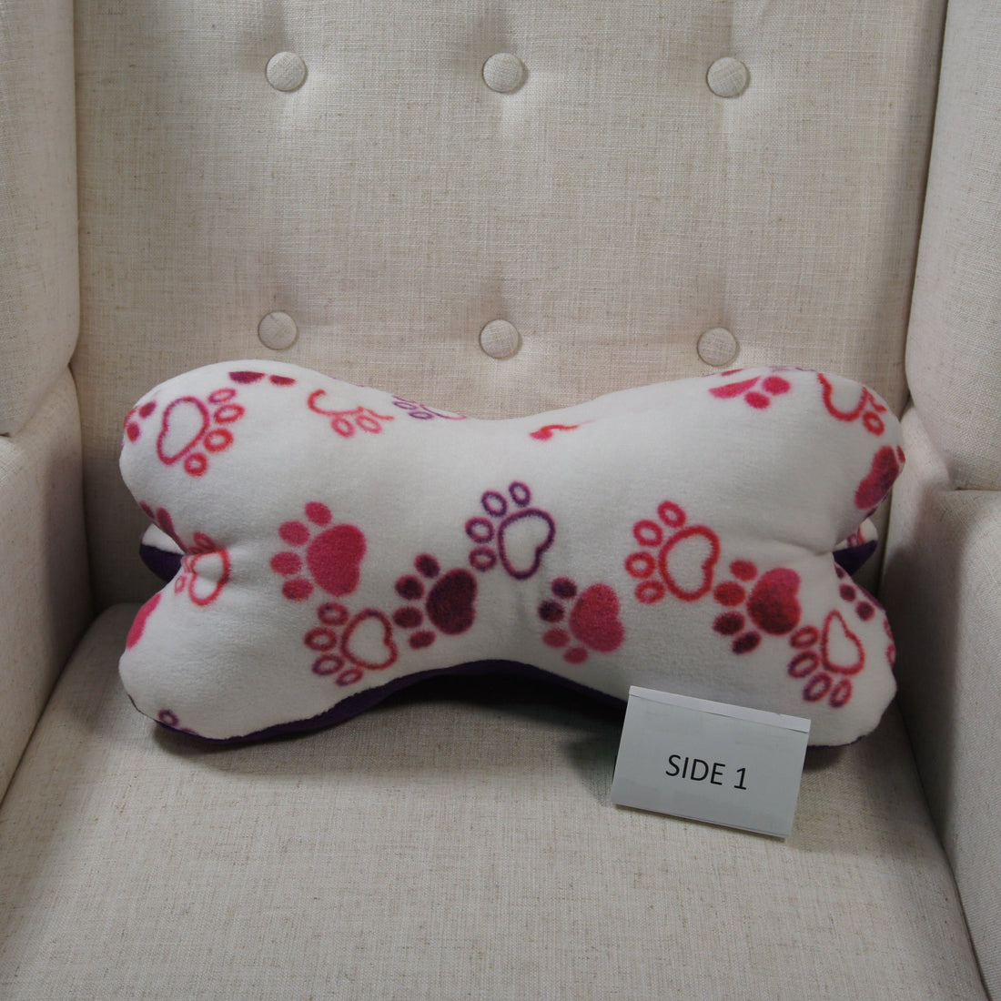 Pillows-Dinosaur-Bone-Accent-Purple-and-Magenta-Paw-Prints